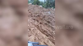 Riders Struggle To Cross Extremely Muddy Road In The Philippines