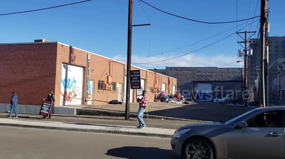 Anti-vaccine protesters hold rally outside vaccination site in Denver