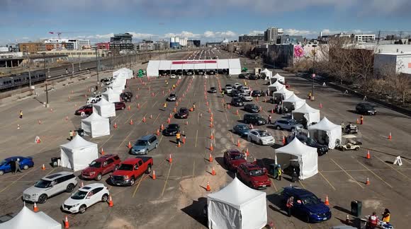A look at a massive vaccination site at Coors Field