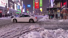 Times Square hit with 16 inches of snow