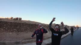 Stunning footage shows an incredible skydive over the Pyramids of Giza.