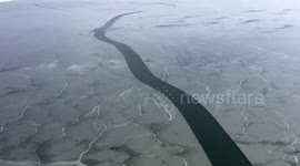 Drone footage reveals hundreds of cracks on frozen lake in southwest China