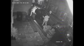 CCTV captures thugs with machetes and swords being chased off by a neighbour with a garden spade