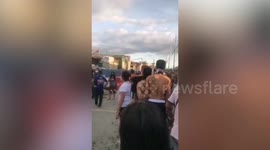 Two dead and dozens taken to hospital after ammonia leak from ice plant in the Philippines