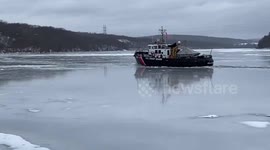 Ice-breaking ship smashes through frozen Connecticut River