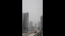 slow motion-flurry of snow