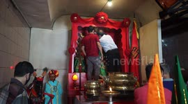 Cleansing God Statues Towards Chinese New Year Celebration