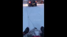 Towing sleigh with car