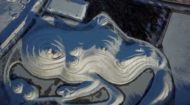 Drone video shows the world’s largest land sculpture of a naked lady