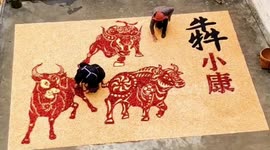 Chinese farmers use grains and chillis to form Chinese characters and oxen to welcome Lunar New Year