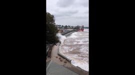 Huge waves damage sea wall and signalling equipment as trains are cancelled along coastal track in Devon during another stormy day in the UK
