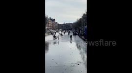Netherlands: Ice Skating Fun On Frozen Canal In Amsterdam 2