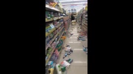 Goods scatter on floor in supermarket as 7.3-magnitude earthquake strikes Japan