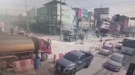 Crane truck hits powerline electrocuting driver in Thailand