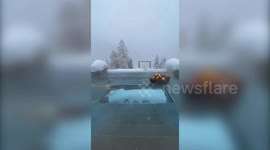 This incredible footage shows a woman enjoying a stay at a luxury alp resort being served a floating tray of breakfast