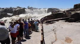 Tourists flock to South Africa waterfall for glimpse of cascade in full flood
