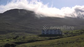 Clouds and mist flowing over the hills of Achill, island, in Mayo, Ireland.