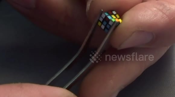 Man creates and solves 5.6mm world's smallest Rubik's Cube puzzle