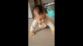 a cute baby with a long tongue