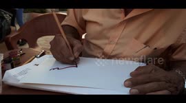 Talented Caligraphy Old Man Using His Skills To Impress Audience