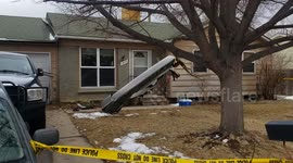 United #328 Airplane explosion mid-air, chunk of metal on top of house