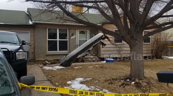 United #328 Airplane explosion mid-air, chunk of metal on top of house