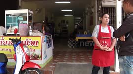 Pretty woman returning from night out caught on CCTV squatting in restaurant to urinate on floor