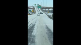 Dallas man is stunned by ice-bound car turned completely around on highway ramp