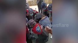 Armed police arrest protesters in Myanmar as violence continues