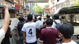 Myanmar protesters face-off with armed police amid tense scene in Yangon