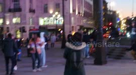 People dance in the street