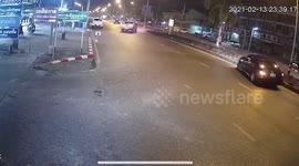 Quick-thinking driver avoids out-of-control pickup truck hurtling towards her