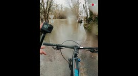 'Frenchman Cycling Through Flooded Trail Accidentally gets the Entire Bike Underwater '