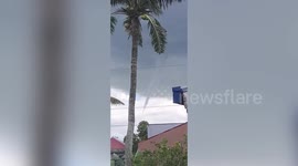 Tornado forms over village in Philippines before rainstorm