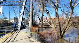 Several bridges closed as loose marina swept along river by floodwater in Kentucky, US