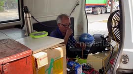 Vietnamese man transforms old van into mobile home after installing solar panels on roof