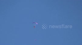 Incredible footage shows the moment a pair of daredevils completed a docking stunt thousands of feet in the air.