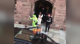 Video has emerged of the moment the Queen shared her blanket with Meghan on their first solo engagement - as described by the Duchess in her Oprah interview