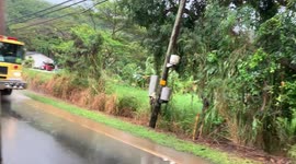 Fire truck during flooding on oahu headong to scene. people sitting in traffic, nothing goes for hours