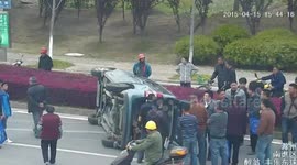 Van flips and skids across China intersection