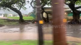 Debris on the side of the road | 7/11 driveway fully flooded | Flash Flood Oahu Hawaii |