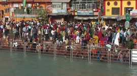 Millions of Hindu devotees enter river Ganges for festival of Kumbh Mela