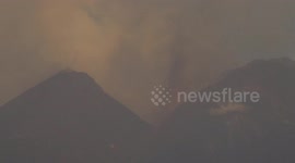 Mount Etna eruption rains down black ash on nearby homes