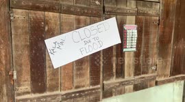 Hawaii Business Closed Due to Flood | Sign on door of local Hawaiian Business shows they closed because of severe flooding over the past days