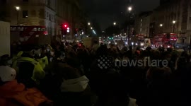 Angry protesters surround Churchill statue