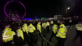 Kill the Bill protesters confront police at Scotland Yard in London