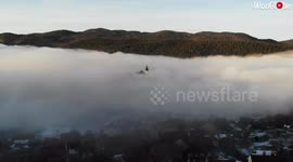'Two Churches Stand Tall as Loški Potok gets Buried in Fog'