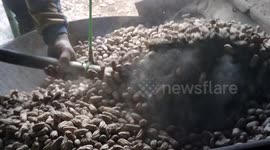 Peanuts mix sand snack roasted  on slow motion video with detail shoot