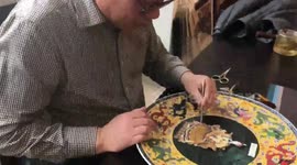 Chinese artist uses feathers to bring his artwork to life