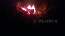 A savage fire made in night at country in a smoke machine